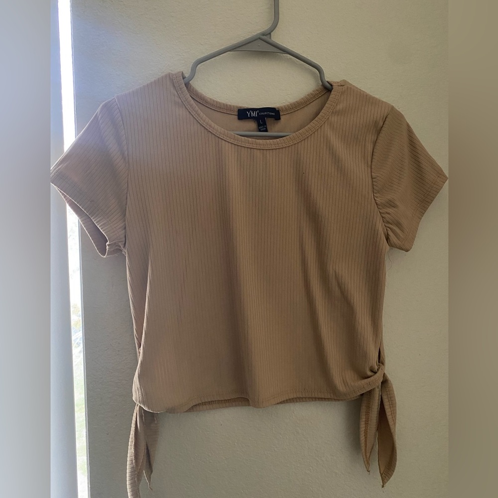 Women’s tan color blouse